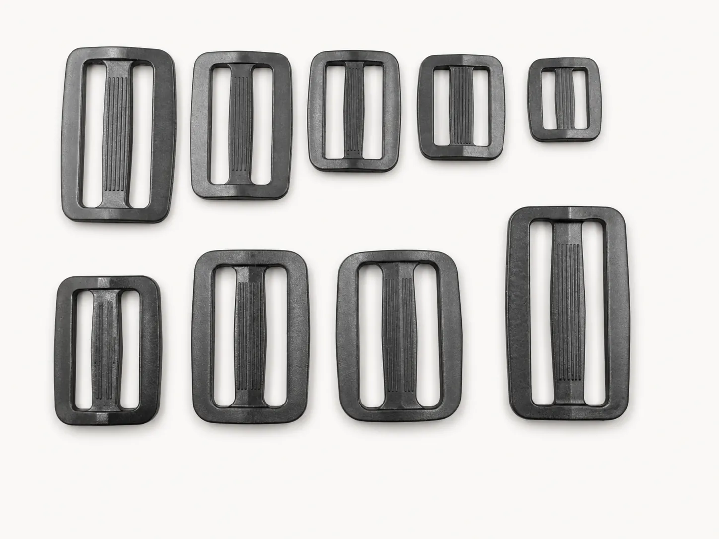 Rectangular plastic triglide slides and strap loops in different sizes