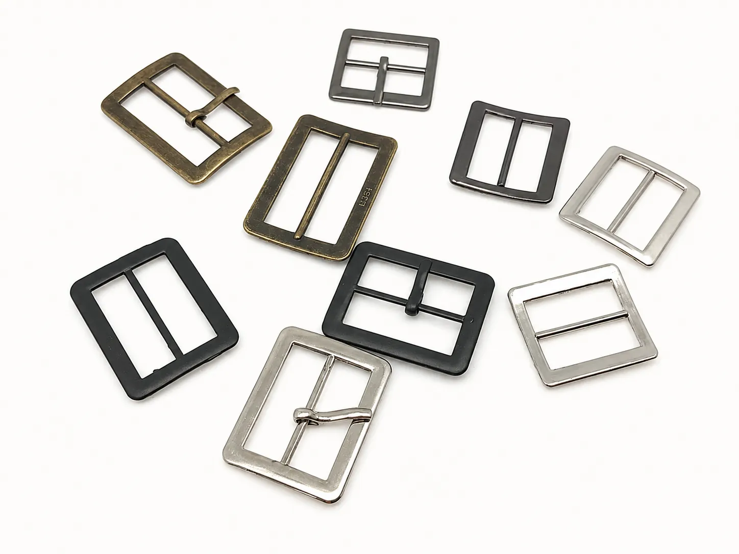 mixed metal pin buckles and slide buckles in antique brass black gunmetal and silver