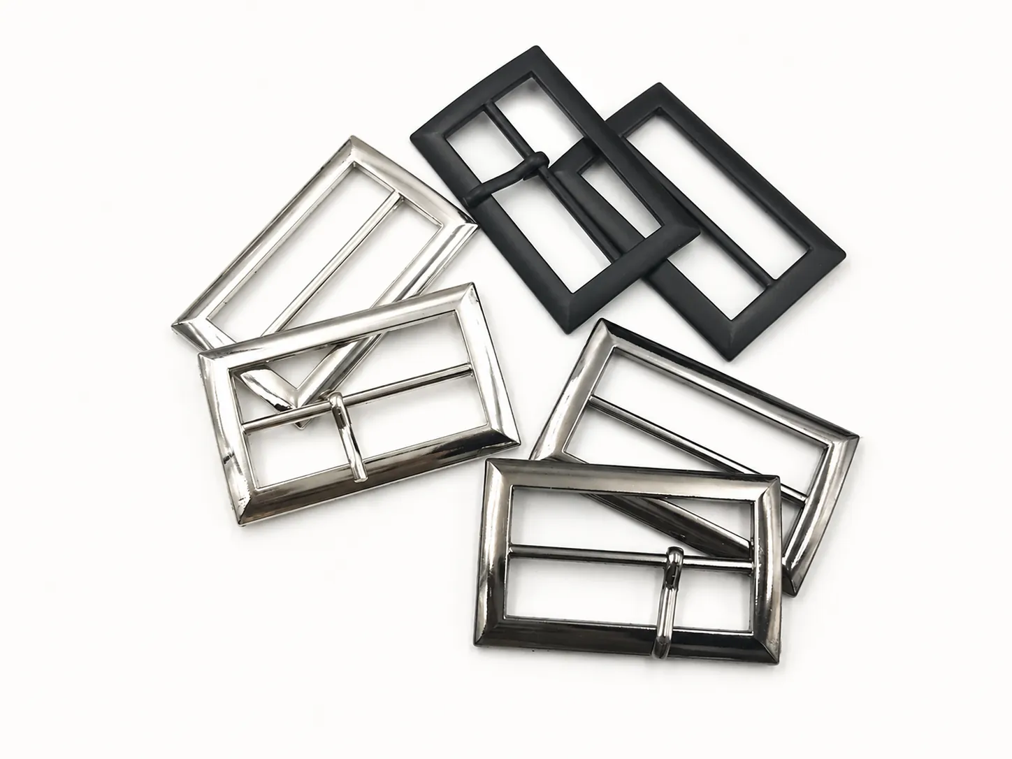 rectangular metal slide buckles and strap frames in black and silver finishes