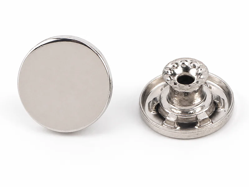 silver front and back tack button set showing cap and shank construction