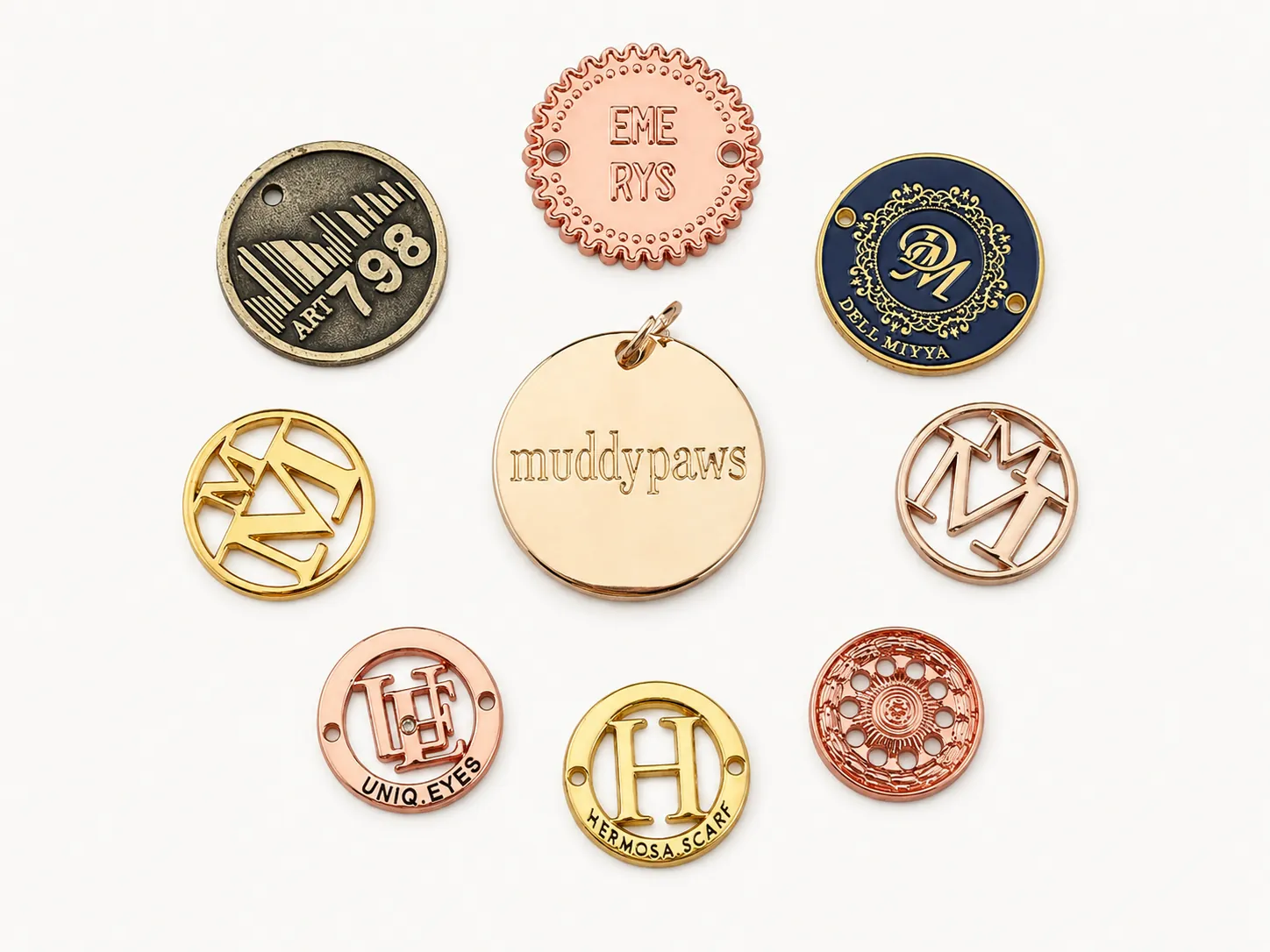 Round metal logo medallion tags in gold rose gold and antique finishes