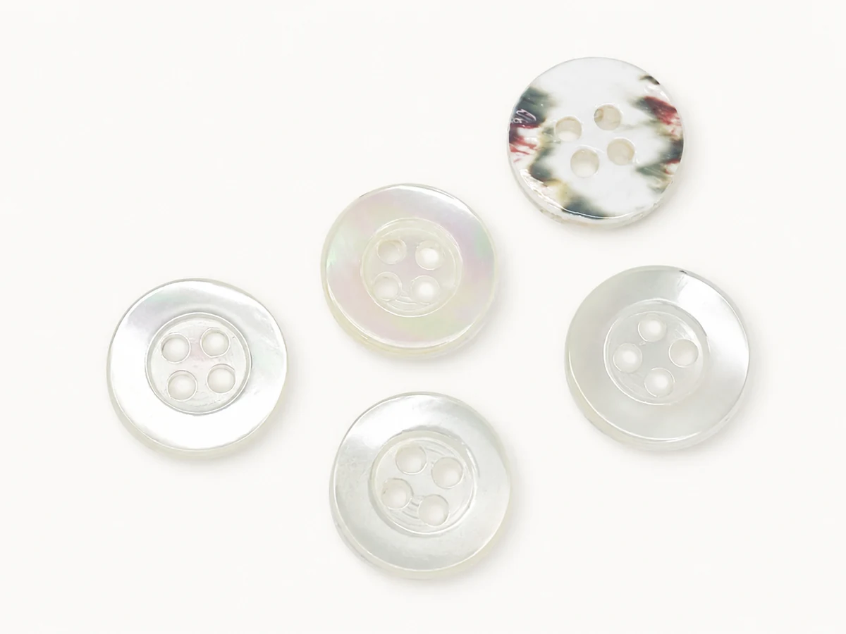 white mother of pearl shell button assortment with four hole shirt buttons