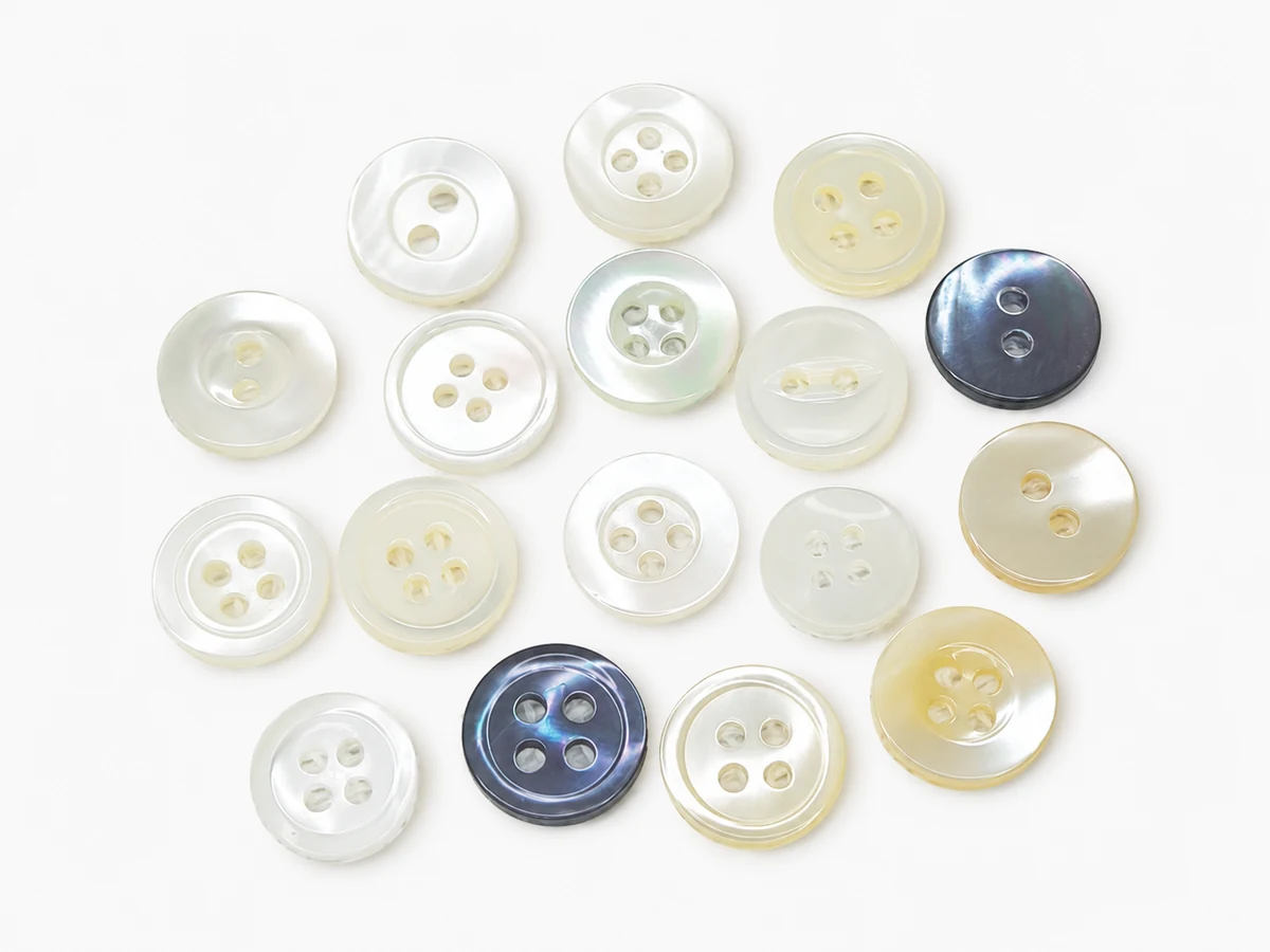 premium assorted mother of pearl shell buttons in white black and ivory finishes