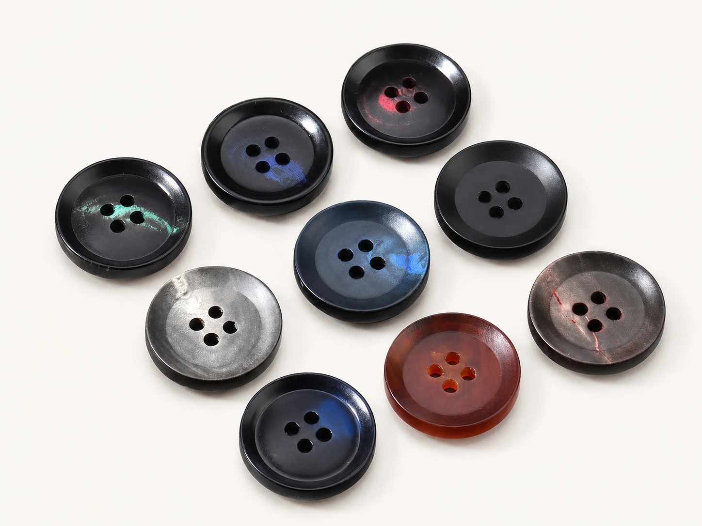 dark smoky horn shirt buttons in black charcoal blue and brown tones