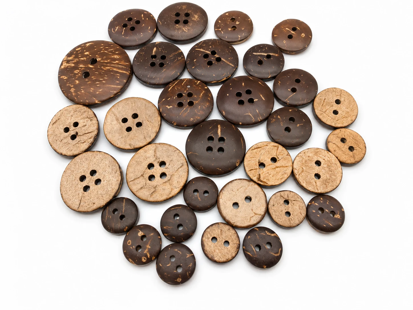 natural coconut shell button assortment with dark outer shell and light inner shell faces