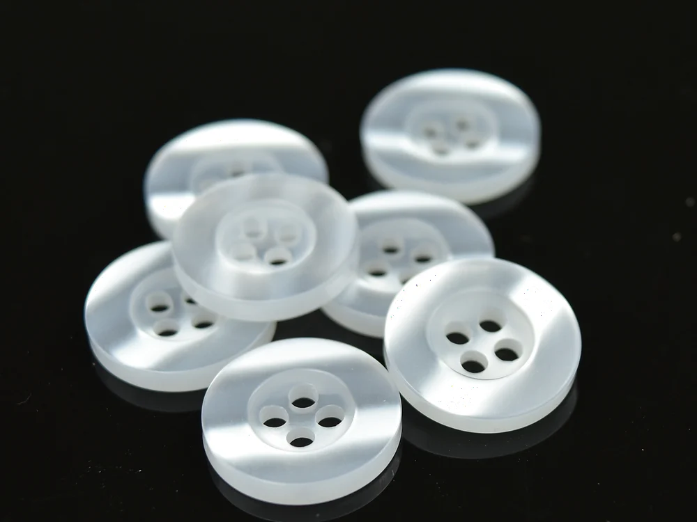 luminous white pearl-effect resin buttons with deep rims