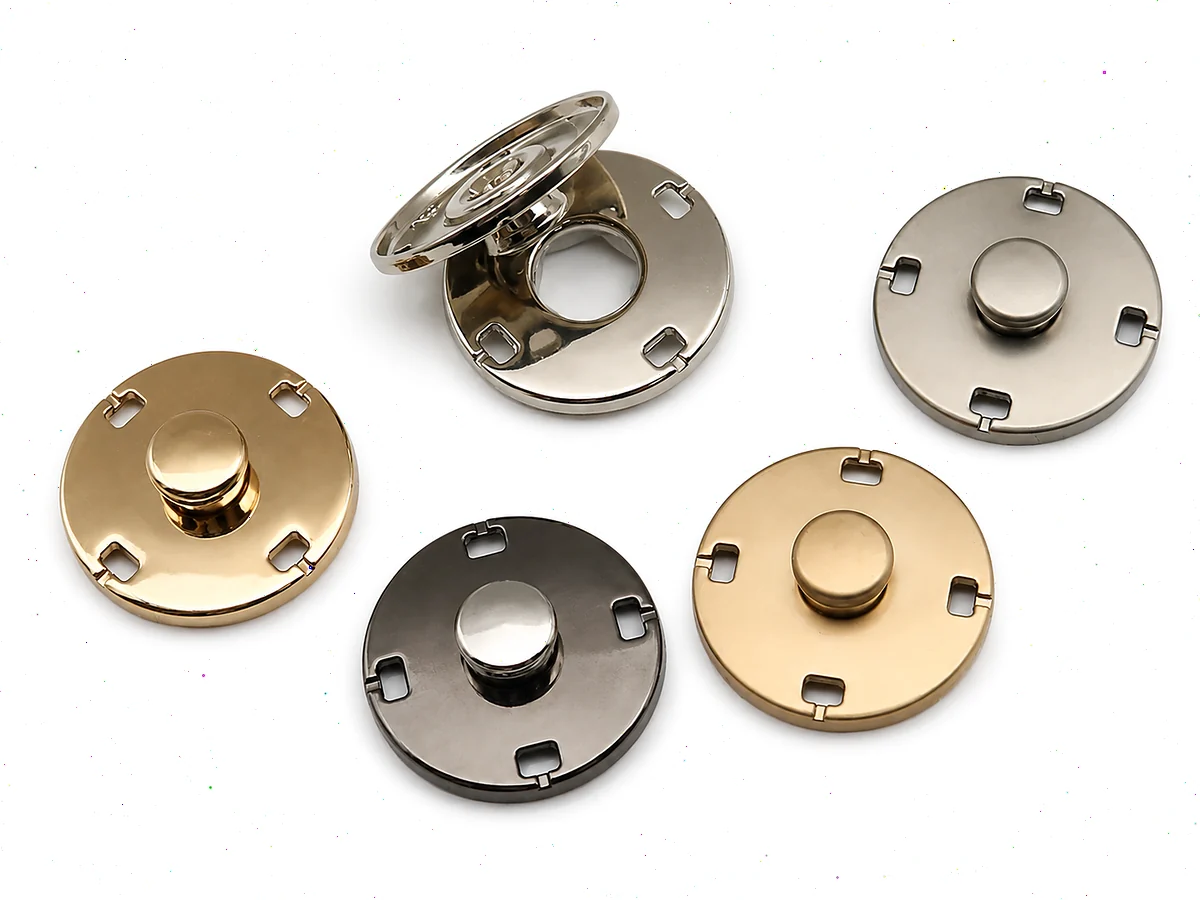 metal four-part snap fasteners in gold silver gunmetal and antique finishes